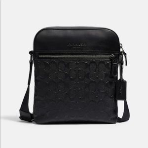 NWT Coach Houston Flight Bag in signature leather- Black